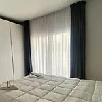 House Baiu Όλμπια